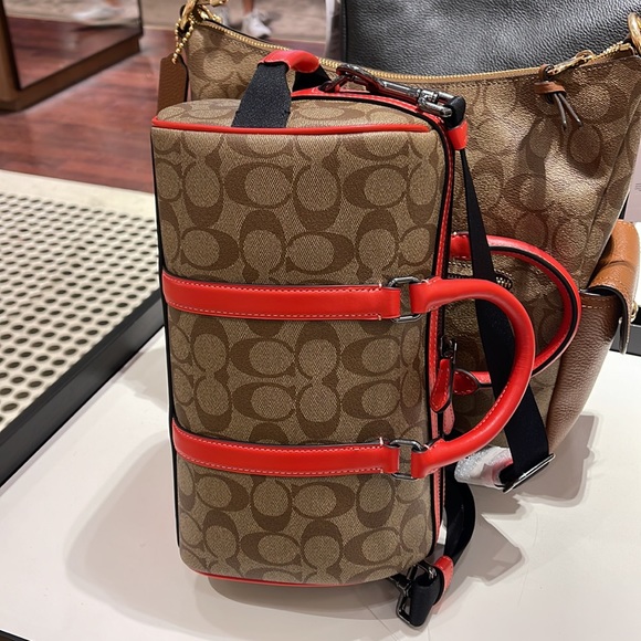 Coach men's Venturer Crossbody 27 In Colorblock Signature Canvas
QB/Khaki/Miami - Picture 12 of 16